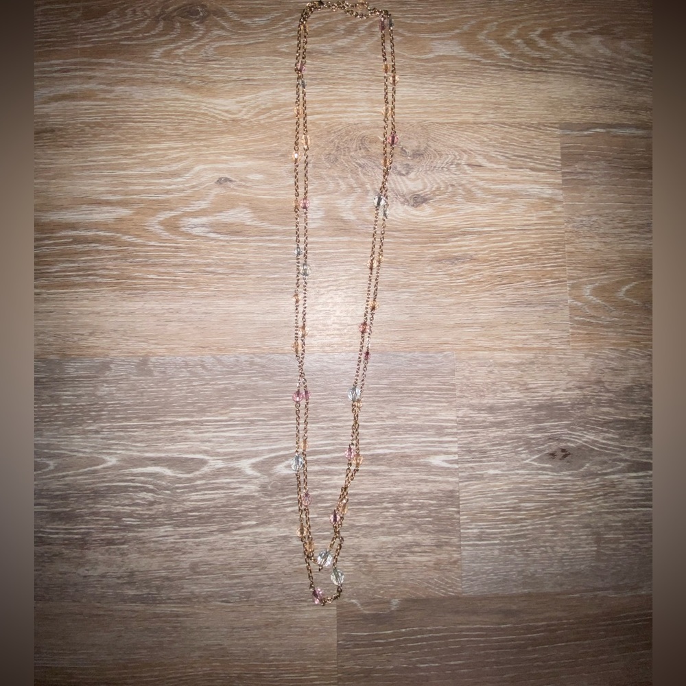 Long layered clear colored beaded necklace
